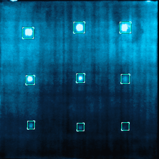 A mid-wave infrared pulsed-thermography frame of a carbon-fiber laminate; an array of subsurface defects appears as bright thermal spots, each enclosed in a detection box where the model locates it.